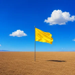 Bandera amarilla plantada en un paisaje vacío, metáfora del territorio de marca que una marca decide ocupar